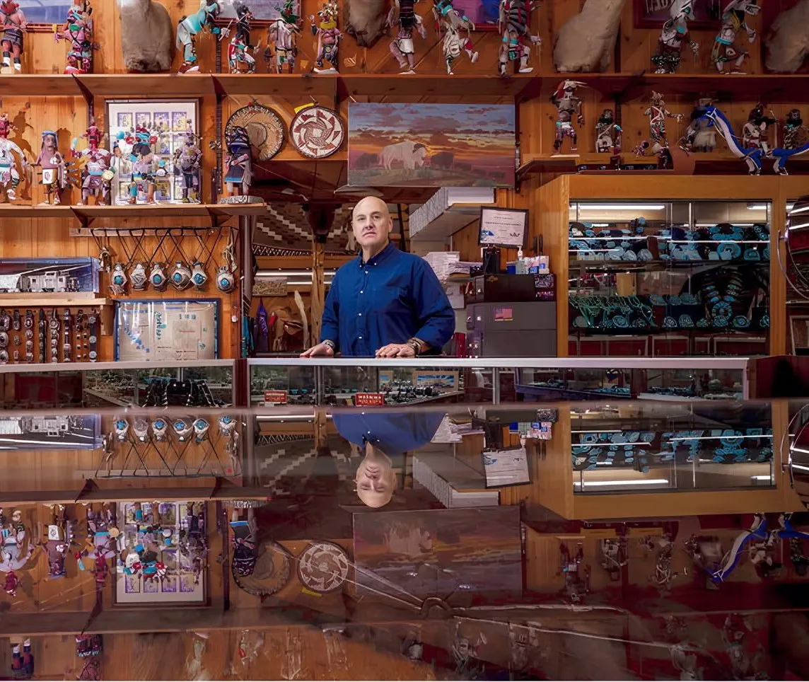 Attorney Billy Keeler at the counter of Richardson's Trading Co., the Navajo trading post beside his Gallup law office